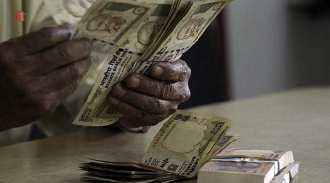 Rupee gains 8 paise to 67.19 vs dollar in early trade