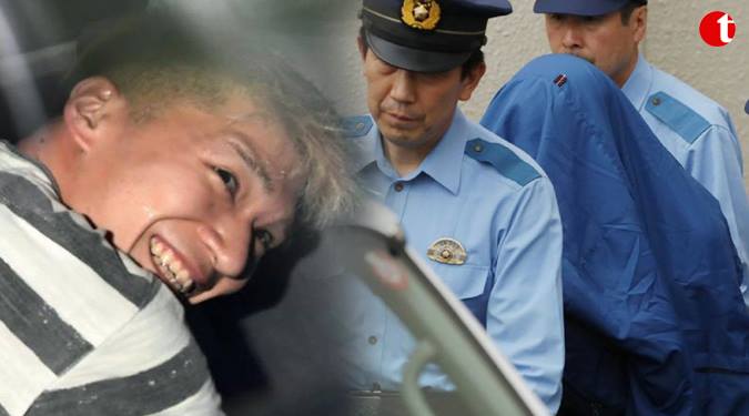 Japan knife attacker grins before cameras