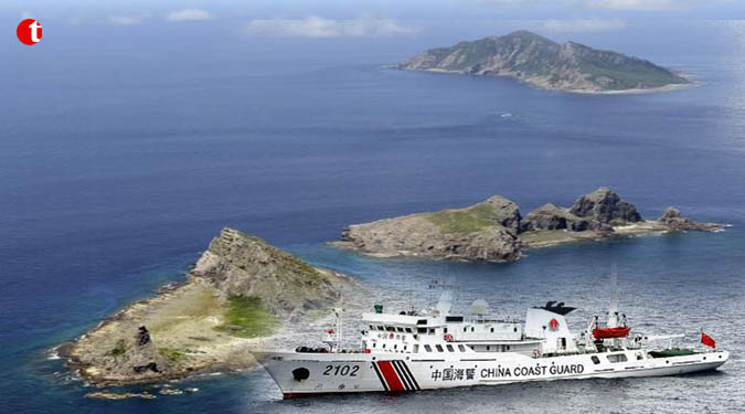 Japan protests as China ships sail near disputed Island