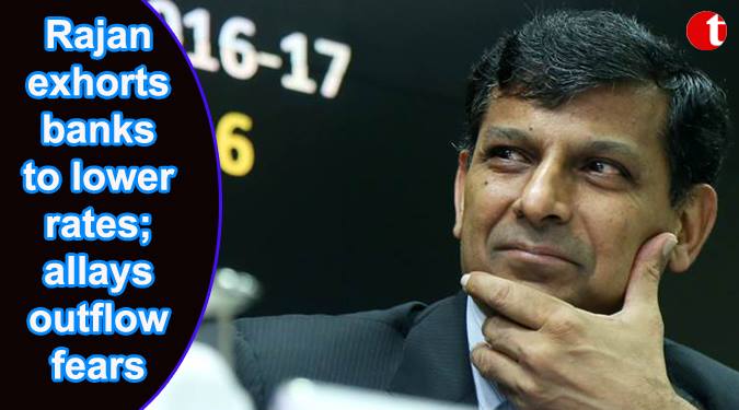 Rajan exhorts banks to lower rates; allays outflow fears