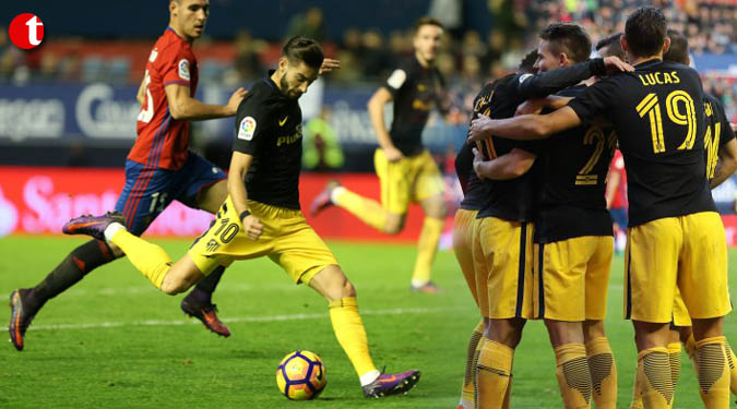 Atletico return to top four with comfortable win at Osasuna