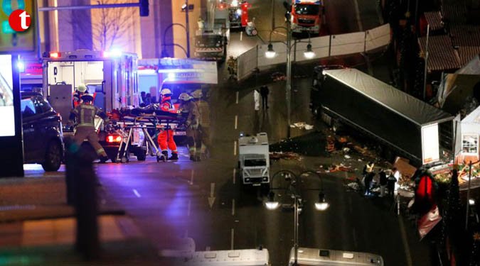 Berlin attack: 12 killed as lorry ploughs into a busy Christmas market