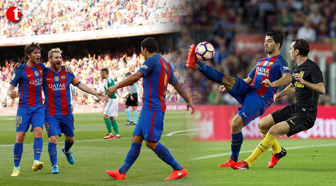 Suarez equaliser saves Barcelona a point in game marred by row