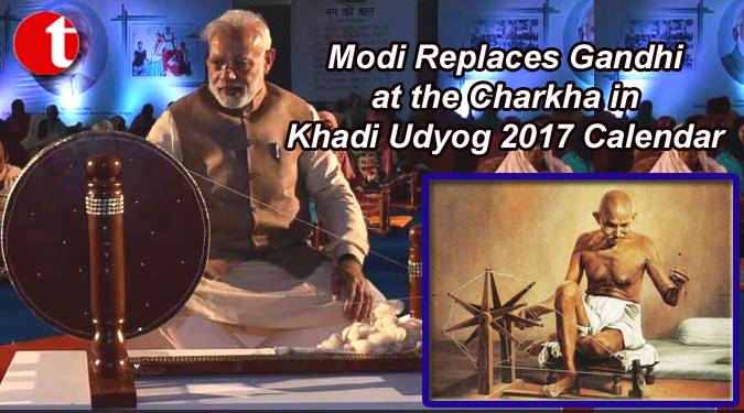 Modi replaces Gandhi at the charkha in Khadi Udyog Calendar