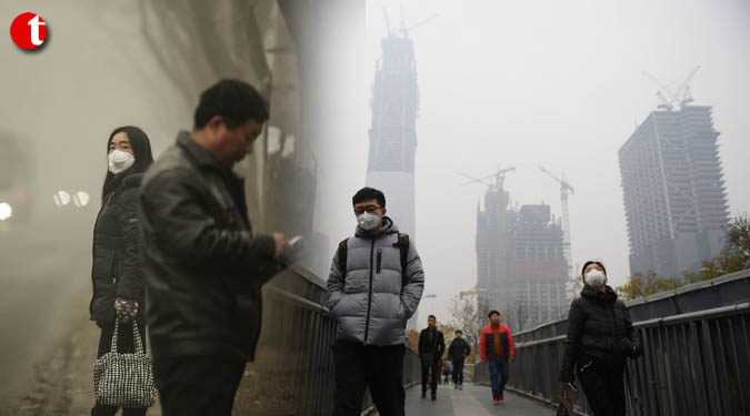 Beijing continues orange alert for air pollution