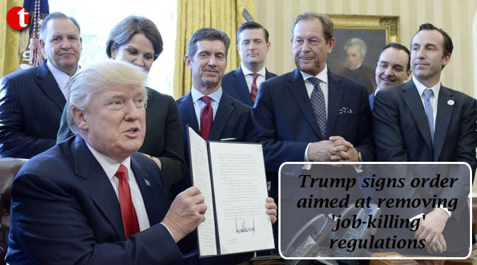 Trump signs order aimed at removing 'job-killing' regulations