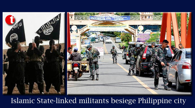 Islamic State-linked militants besiege Philippine city