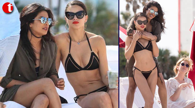 Priyanka Chopra, Adriana Lima get touchy-feely on Miami beach