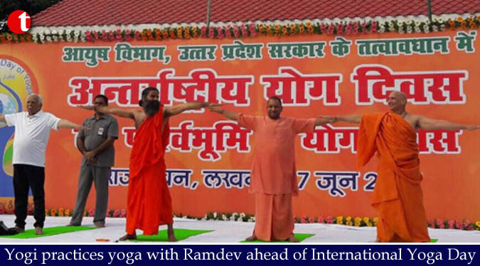 Yogi practices Yoga with Ramdev ahead of International Yoga Day