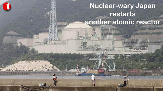 Nuclear-wary Japan restarts another atomic reactor