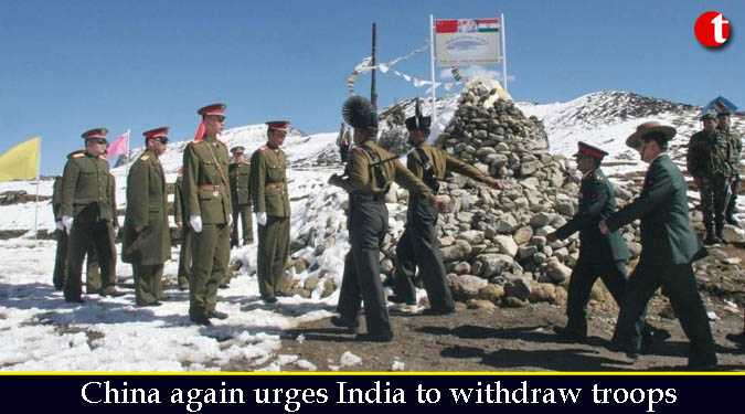 China again urges India to withdraw troops