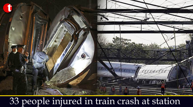 33 people injured in train crash at station