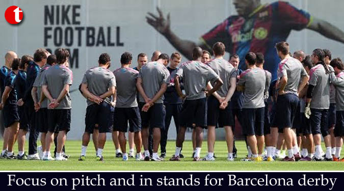 Focus on pitch and in stands for Barcelona derby
