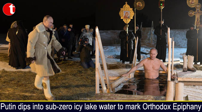 Putin dips into sub-zero icy lake water to mark Orthodox Epiphany