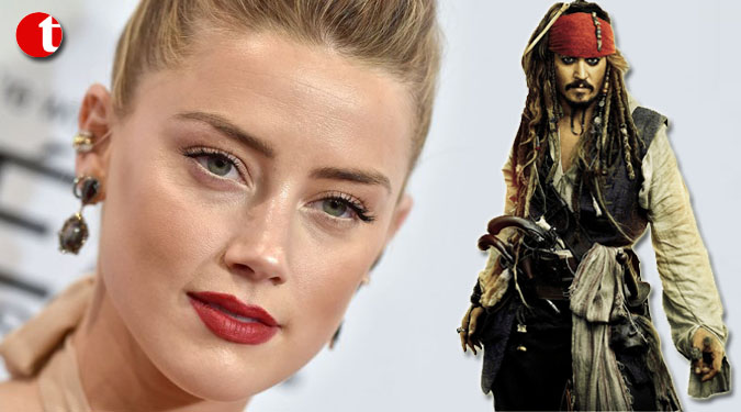 Amber Heard looks back at tough time with Johnny Depp