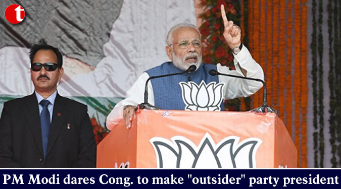 PM Modi dares Cong.to make "outsider" party president