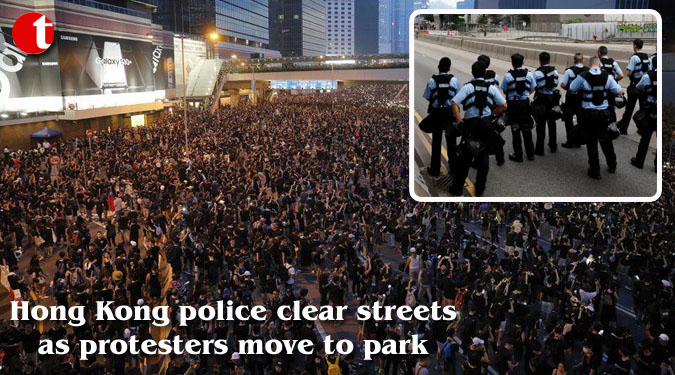Hong Kong police clear streets as protesters move to park