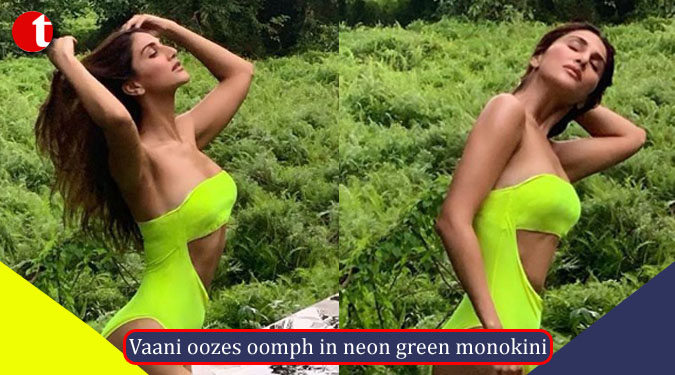 Vaani oozes oomph in neon green monokini