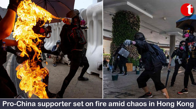 Pro-China supporter set on fire amid chaos in Hong Kong