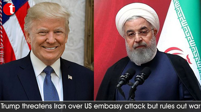 Trump threatens Iran over US embassy attack but rules out war