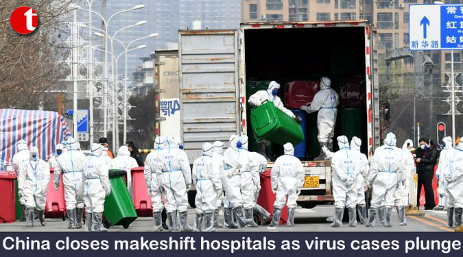 China closes makeshift hospitals as virus cases plunge