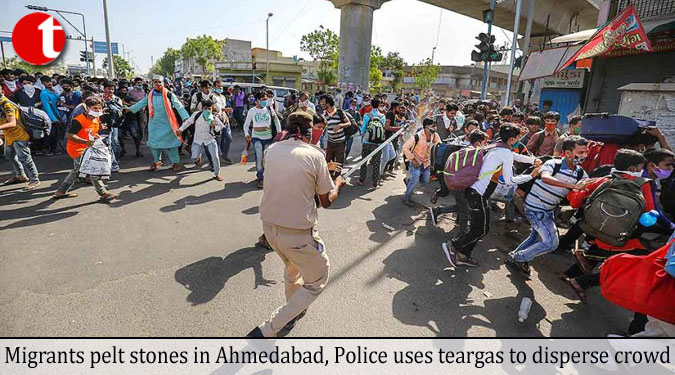 Migrants pelt stones in Ahmedabad, Police uses teargas to disperse crowd