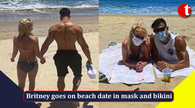 Britney Spears goes on beach date in mask and bikini