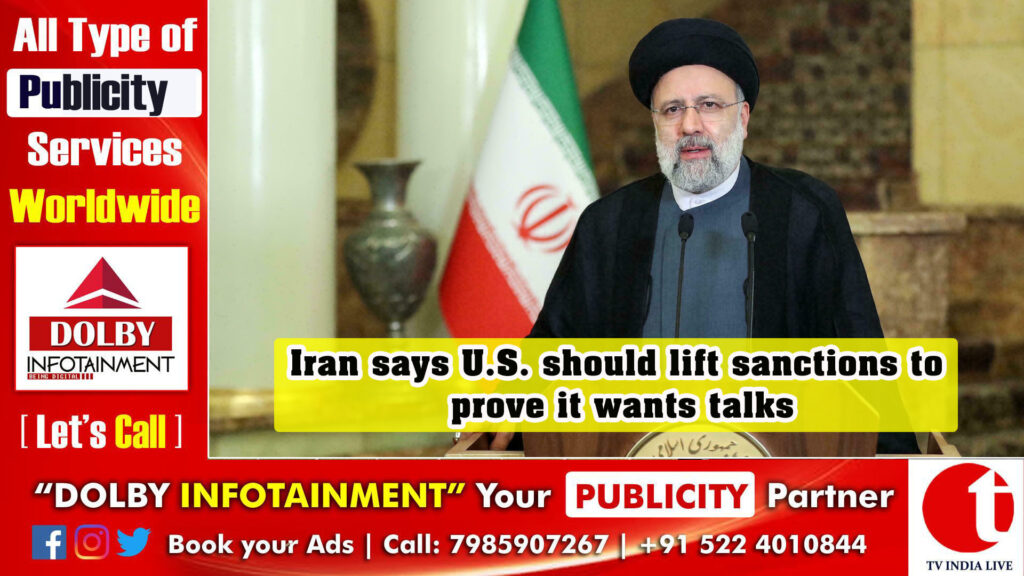 Iran says U.S. should lift sanctions to prove it wants talks