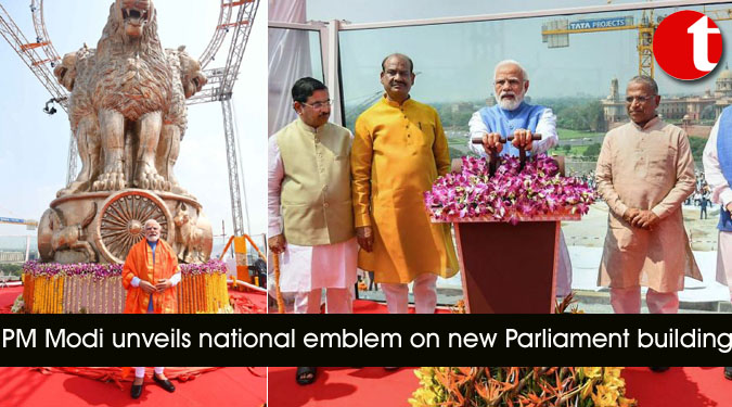 PM Modi unveils national emblem on new Parliament building