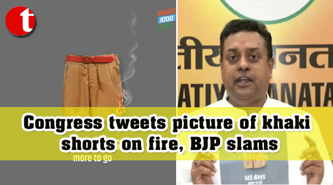 Congress tweets picture of khaki shorts on fire, BJP slams