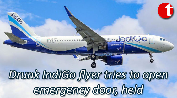 Drunk IndiGo flyer ties to open emergency door, held